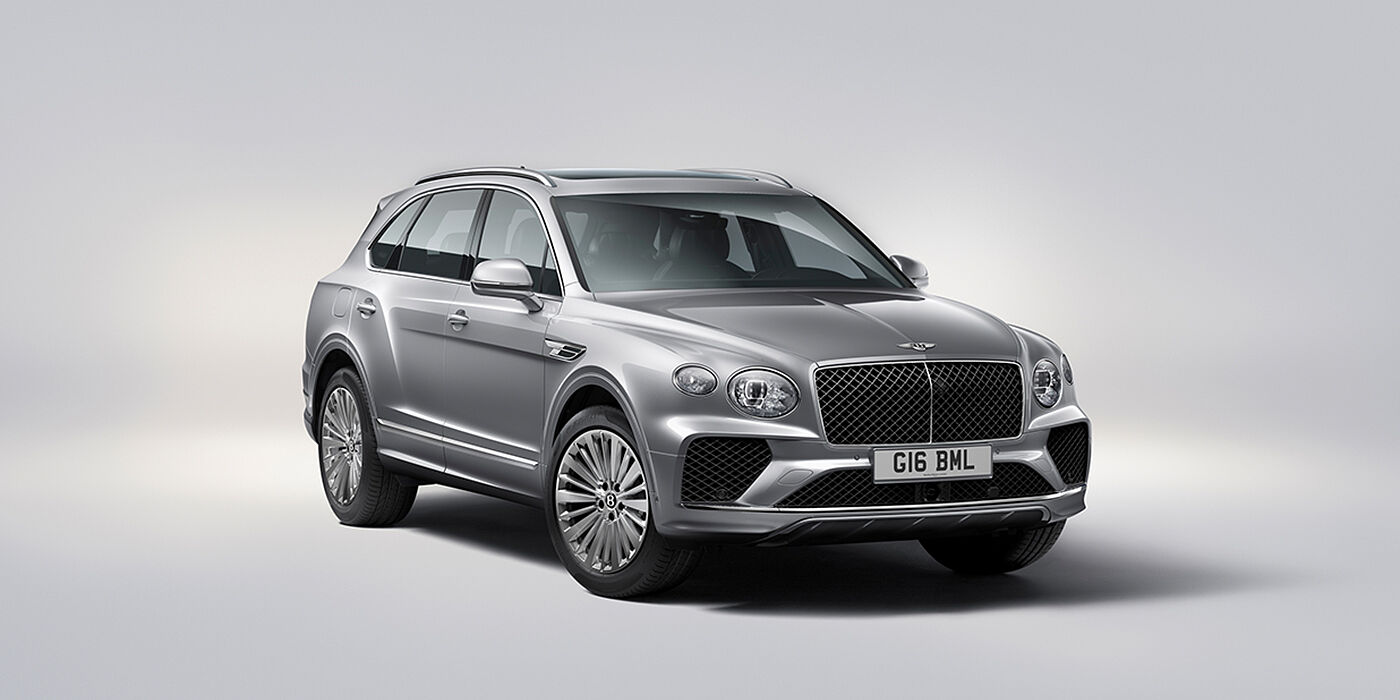 Bentley Essex (Chelmsford) Bentley Bentayga luxury SUV front three quarter view in Moonbeam paint with matrix grille and 21″ 5 spoke painted wheels