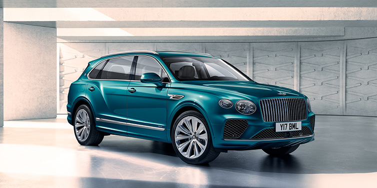 Bentley Essex (Chelmsford) Bentley Bentayga Extended Wheelbase Azure SUV front three quarter in Topaz blue paint colour with a grey background